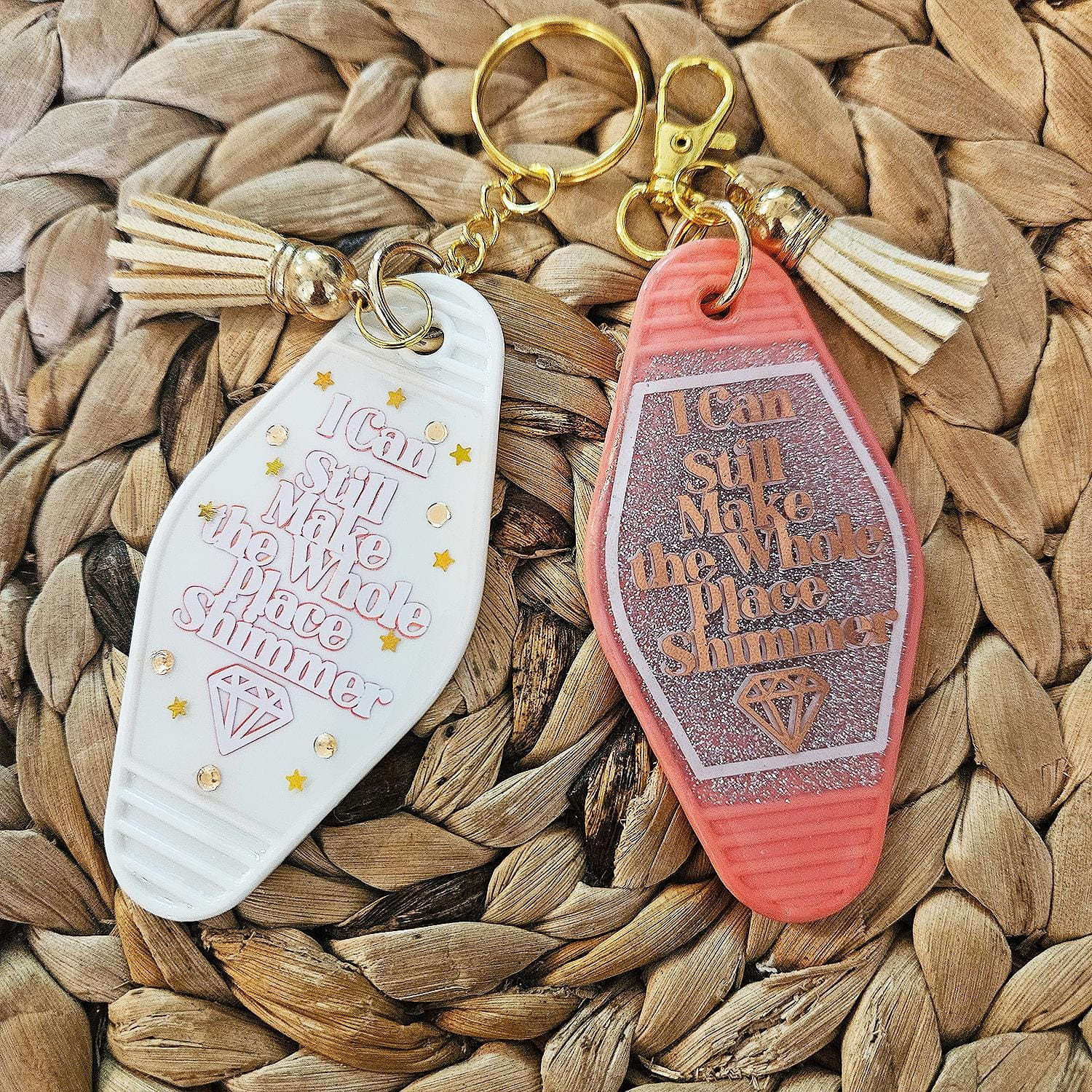 Bejeweled keychain. Choose white or coral pink. The keychain states I can still make the whole world shimmer.