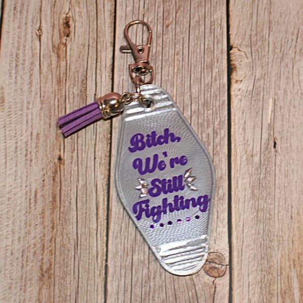 Loud Color. Louder Statements. - ShesSoCrafty Goods Protest Motel Keychain - Bitch, Weβre Still Fighting Keychain β Keychains β Handmade By Shessocrafty Goods