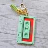 il_fullxfull.7581660744_hamc Showgirl Era Cassette Keychain – Personalized Retro Mixtape Bag Charm With Tassel – Keychains – Handmade By Shessocrafty Goods