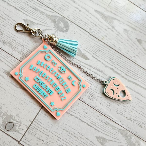 il_fullxfull.7581669066_a34f-1 Talking Board Bag Charm – Divination-Inspired 3D Printed Keychain With Planchette – Keychains – Handmade By Shessocrafty Goods