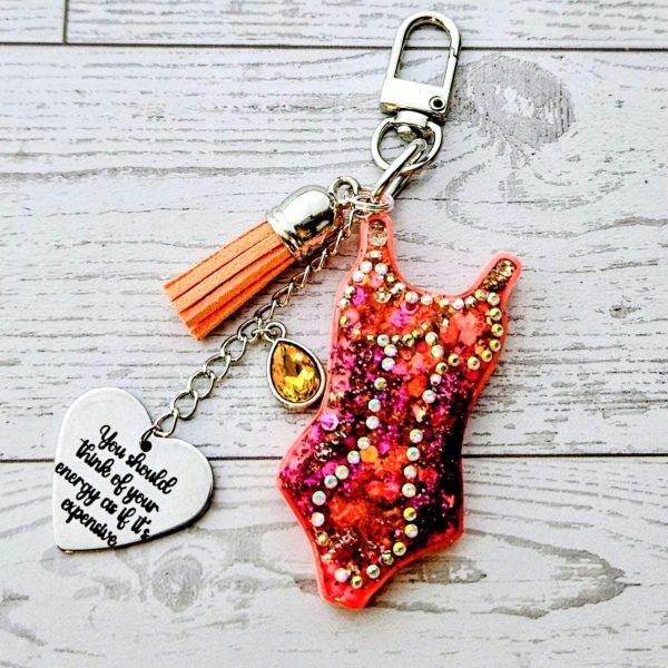 Loud Color. Louder Statements. - ShesSoCrafty Goods Orange Showgirl Era Bodysuit Keychain β Rhinestone Resin Bag Charm With Engraved Quote β Keychains β Handmade By Shessocrafty Goods