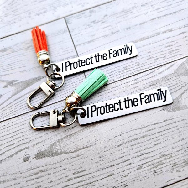 Loud Color. Louder Statements. - ShesSoCrafty Goods I Protect The Family Keychain β’ Stainless Steel Bar With Tassel β Keychains β Handmade By Shessocrafty Goods