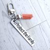 I Protect The Family Keychain • Stainless Steel Bar With Tassel – Keychains – Handmade By Shessocrafty Goods