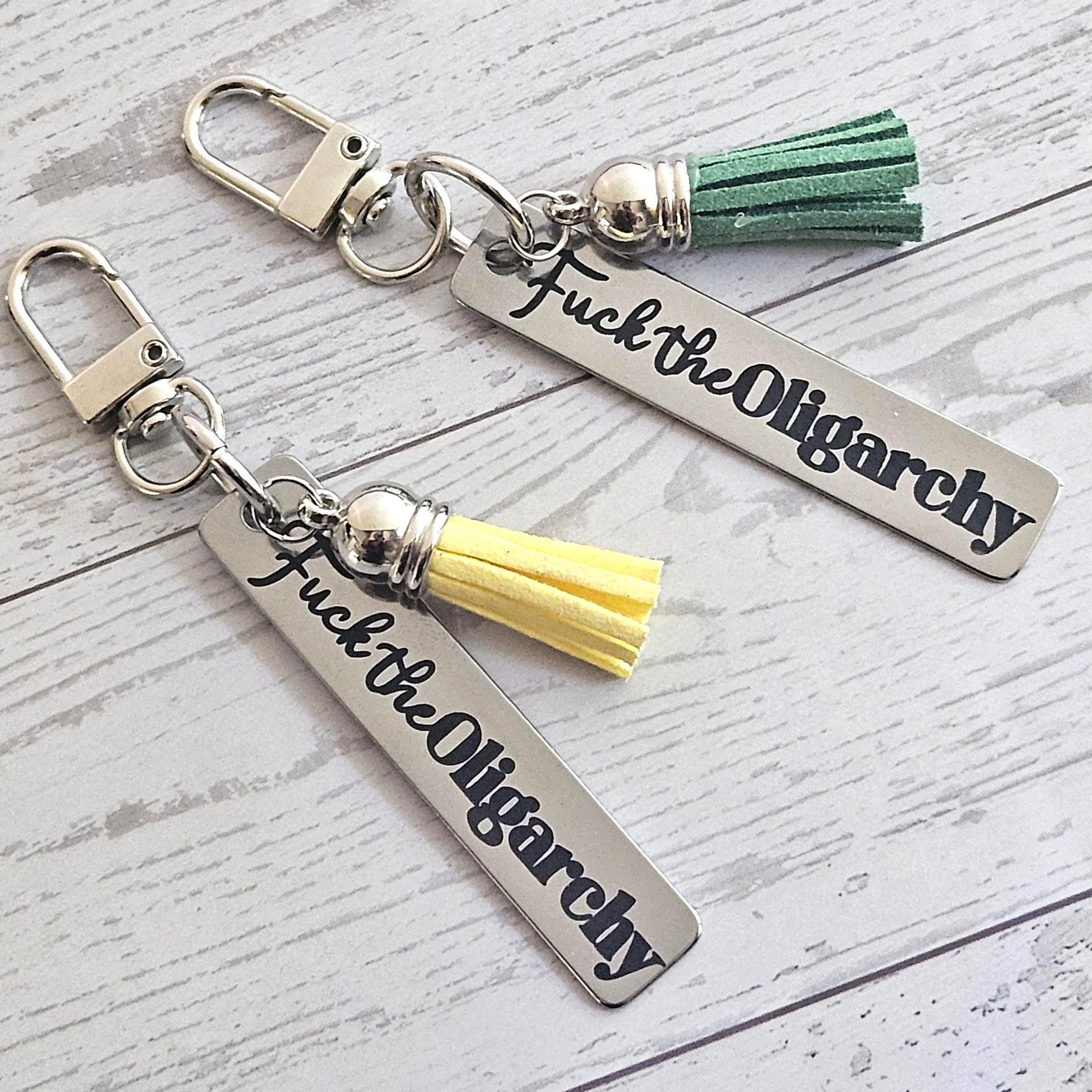 Fuck the Oligarchy Keychain with Tassel – Feminist Stainless Steel Statement Accessory Fuck The Oligarchy Keychain With Tassel – Feminist Stainless Steel Statement Accessory – Keychains – Handmade By Shessocrafty Goods