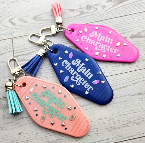 Loud Color. Louder Statements. - ShesSoCrafty Goods Main Character Motel Keychain | Retro Hotel Tag, Rhinestone Tassel Charm β Keychains β Handmade By Shessocrafty Goods