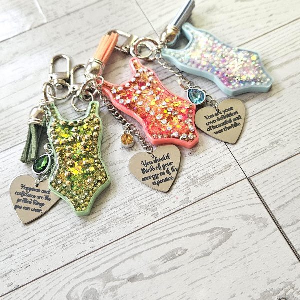 il_fullxfull.7581636626_sy1h Custom Showgirl Eras Bodysuit Keychain – Personalized Glitter Resin Bag Charm with Engraved Quote – Keychains – Handmade by ShesSoCrafty Goods