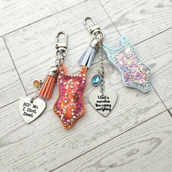 il_fullxfull.7581636964_qohs Custom Showgirl Eras Bodysuit Keychain – Personalized Glitter Resin Bag Charm with Engraved Quote – Keychains – Handmade by ShesSoCrafty Goods