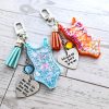 il_fullxfull.7606454984_klya Custom Showgirl Eras Bodysuit Keychain – Personalized Glitter Resin Bag Charm with Engraved Quote – Keychains – Handmade by ShesSoCrafty Goods
