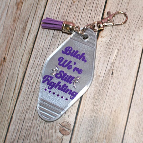Protest Motel Keychain Bag Charm, We're Still Fighting – Keychains – Handmade by ShesSoCrafty Goods