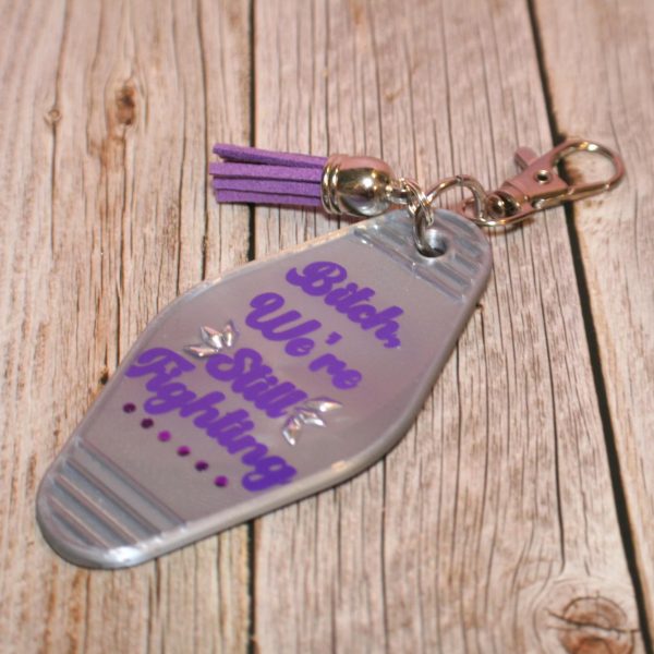 Protest Motel Keychain Bag Charm, We're Still Fighting – Keychains – Handmade by ShesSoCrafty Goods