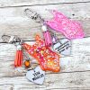 il_fullxfull.7629583517_ojlr Custom Showgirl Eras Bodysuit Keychain – Personalized Glitter Resin Bag Charm with Engraved Quote – Keychains – Handmade by ShesSoCrafty Goods