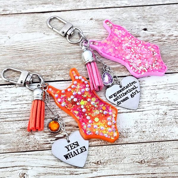 il_fullxfull.7629583517_ojlr Custom Showgirl Eras Bodysuit Keychain – Personalized Glitter Resin Bag Charm with Engraved Quote – Keychains – Handmade by ShesSoCrafty Goods