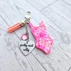 il_fullxfull.7654390631_oudp Custom Showgirl Eras Bodysuit Keychain – Personalized Glitter Resin Bag Charm with Engraved Quote – Keychains – Handmade by ShesSoCrafty Goods