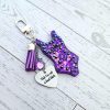 il_fullxfull.7654392125_pmo8 Custom Showgirl Eras Bodysuit Keychain – Personalized Glitter Resin Bag Charm with Engraved Quote – Keychains – Handmade by ShesSoCrafty Goods