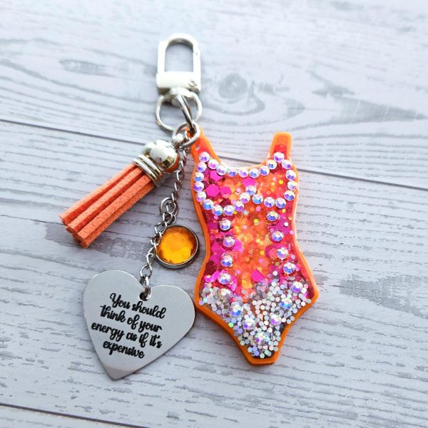 il_fullxfull.7853694546_tgjf Orange Showgirl Era Keychain – Rhinestone Resin Bag Charm with Engraved Quote – Keychains – Handmade by ShesSoCrafty Goods