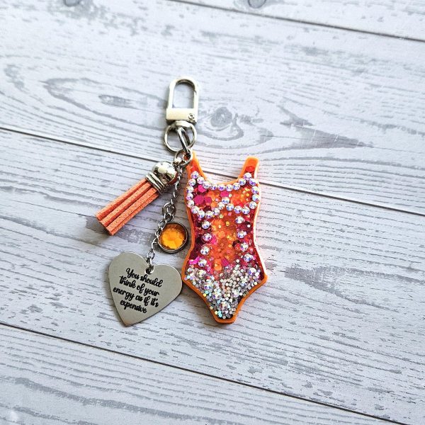 il_fullxfull.7901652815_5fgb Orange Showgirl Era Keychain – Rhinestone Resin Bag Charm with Engraved Quote – Keychains – Handmade by ShesSoCrafty Goods