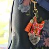 il_fullxfull.7961658239_oawt Orange Showgirl Era Keychain – Rhinestone Resin Bag Charm with Engraved Quote – Keychains – Handmade by ShesSoCrafty Goods