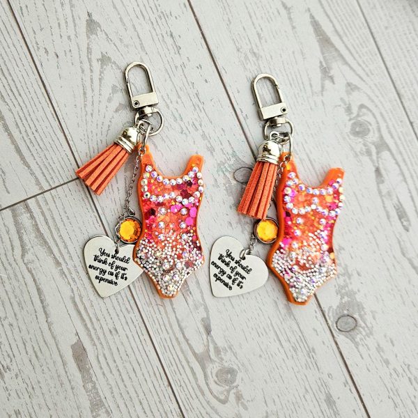 il_fullxfull.7961661883_db44 Orange Showgirl Era Keychain – Rhinestone Resin Bag Charm with Engraved Quote – Keychains – Handmade by ShesSoCrafty Goods